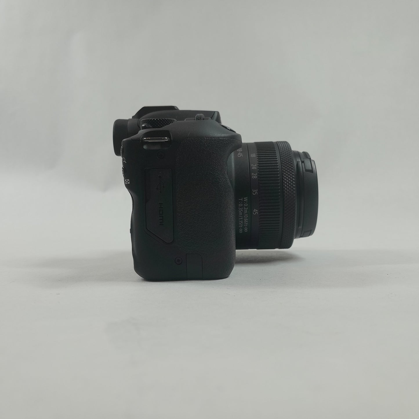 Canon EOS R100 24.1MP Digital Point-And-Shoot Camera